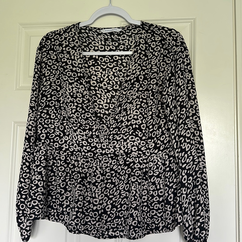 Long sleeve peplum blouse